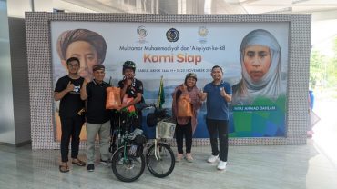 Syiarkan Muktamar, Pasutri Purbalingga Gowes ke Solo